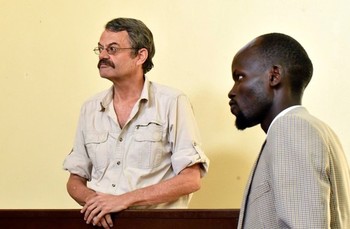 William John Endley stands in the dock as his Lawyer Gar looks on, in the High Court in Juba February 13, 2018. REUTERS
