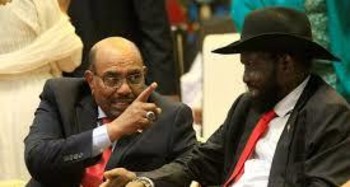 South Sudan’s President Salva Kiir (right) talks to Sudan’s President Omar Hassan Al Bashir after signing a ceasefire and power-sharing agreement with South Sudanese rebel leader Riek Machar in Khartoum, Sudan, on August 5 (Reuters photo)