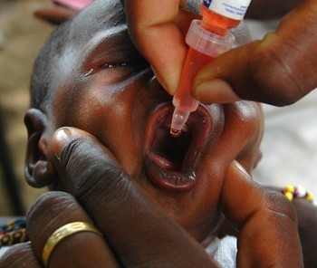 A child receiving polio vaccine in South Sudan. Photo by Edward Parsons/IRIN