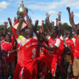 Malekia FC team members celebrating being crowned state champions